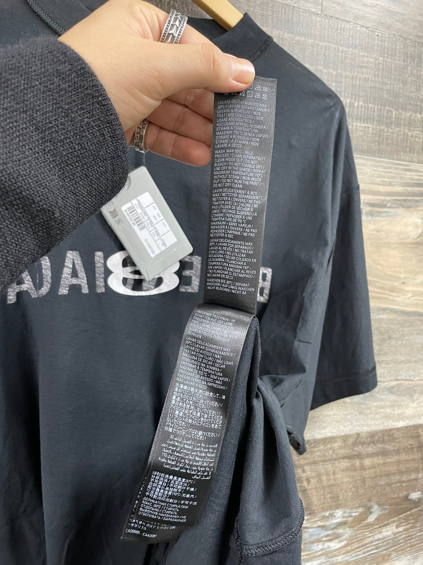 1 - Balenciaga Back Flip logo-print oversized cotton T-shirt