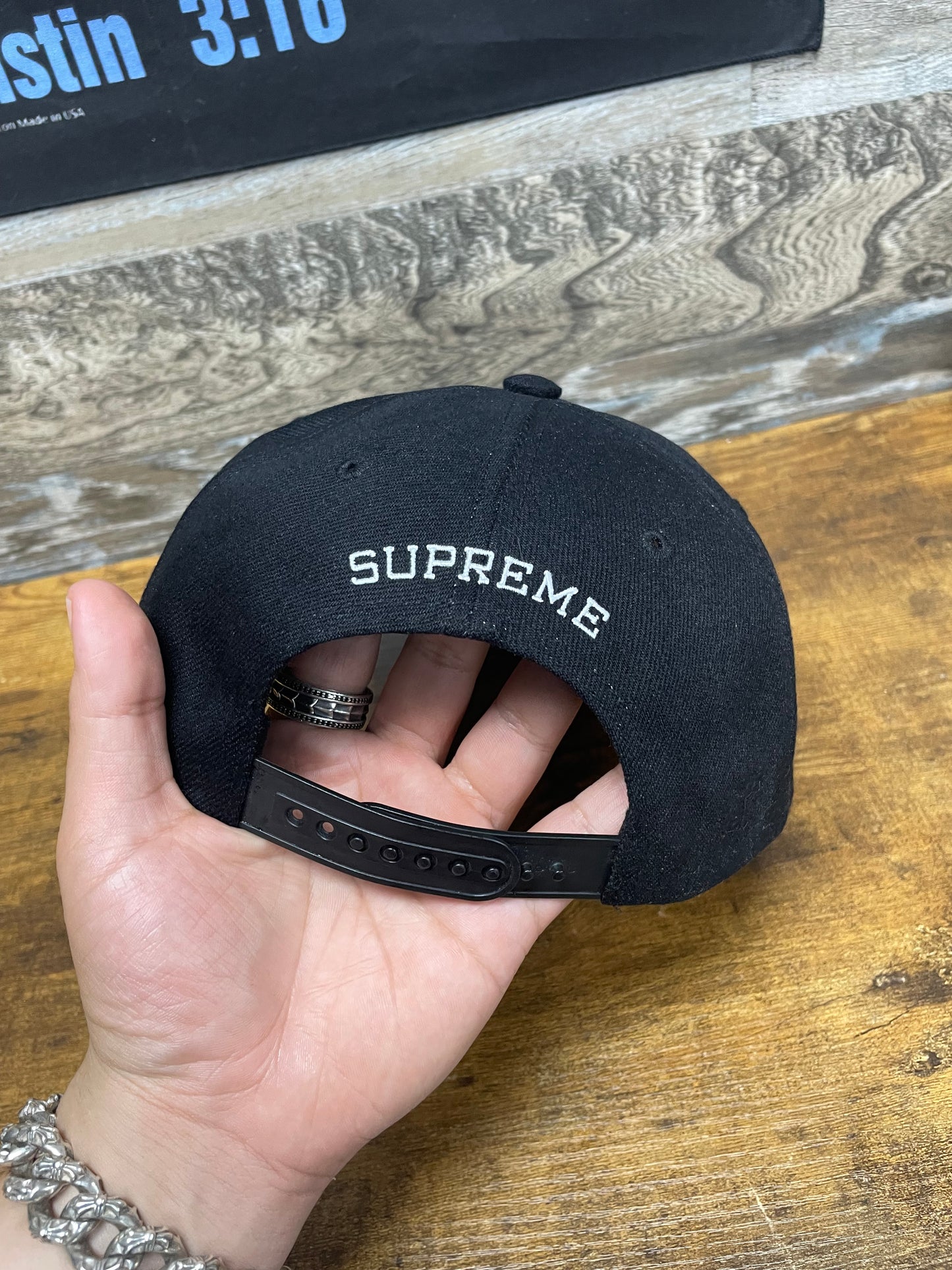 OS - Supreme Script Logo 6-Panel hat in black from the SS24 season