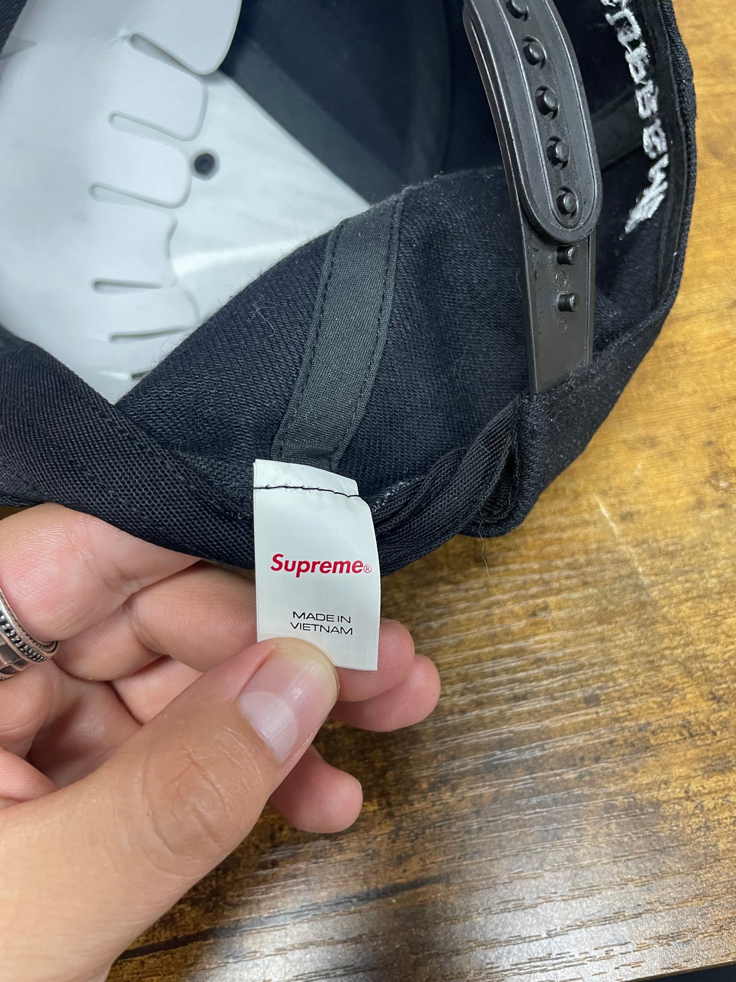 OS - Supreme Script Logo 6-Panel hat in black from the SS24 season