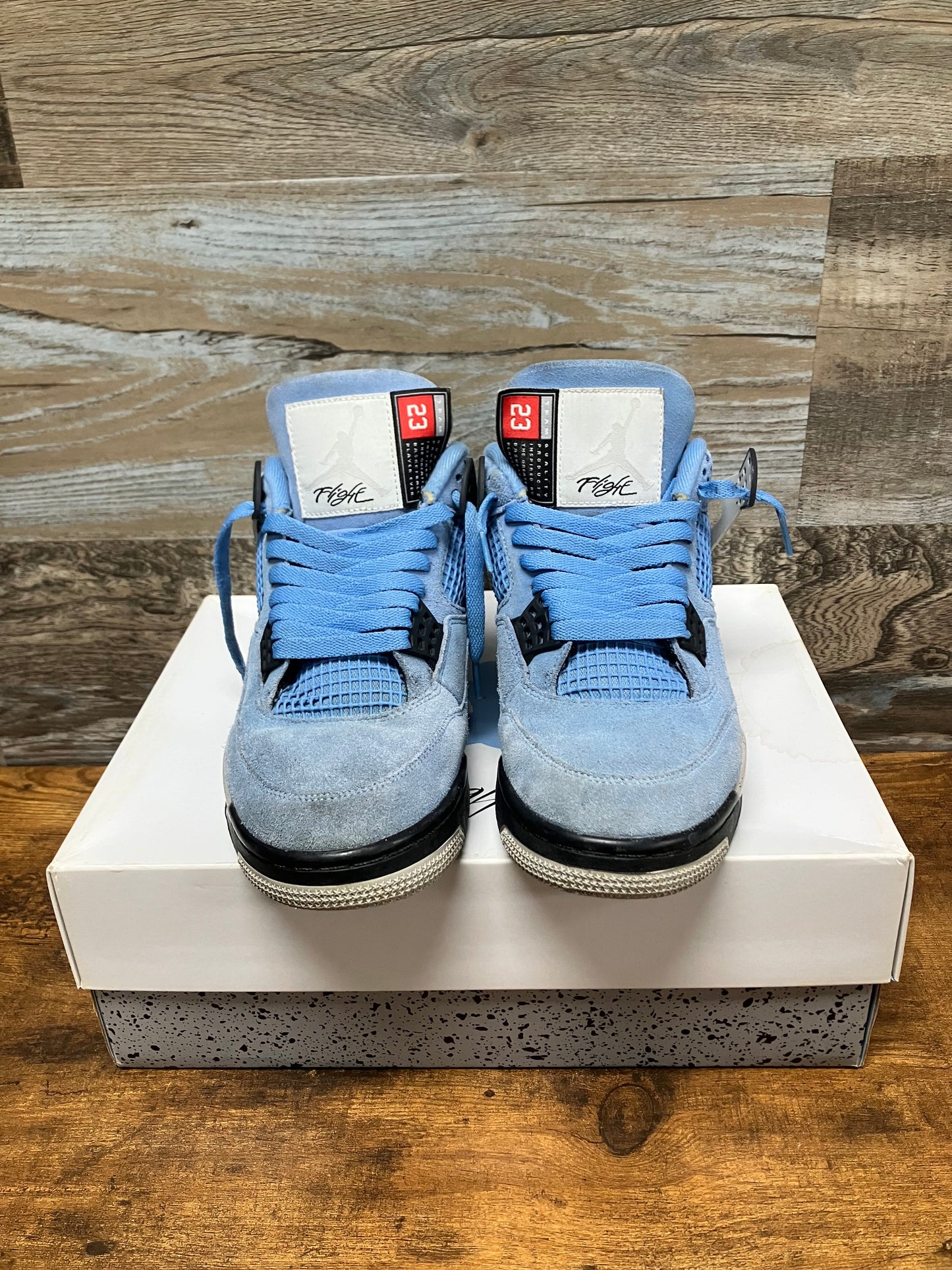 Air Jordan 4 Retro Mid University Blue 9