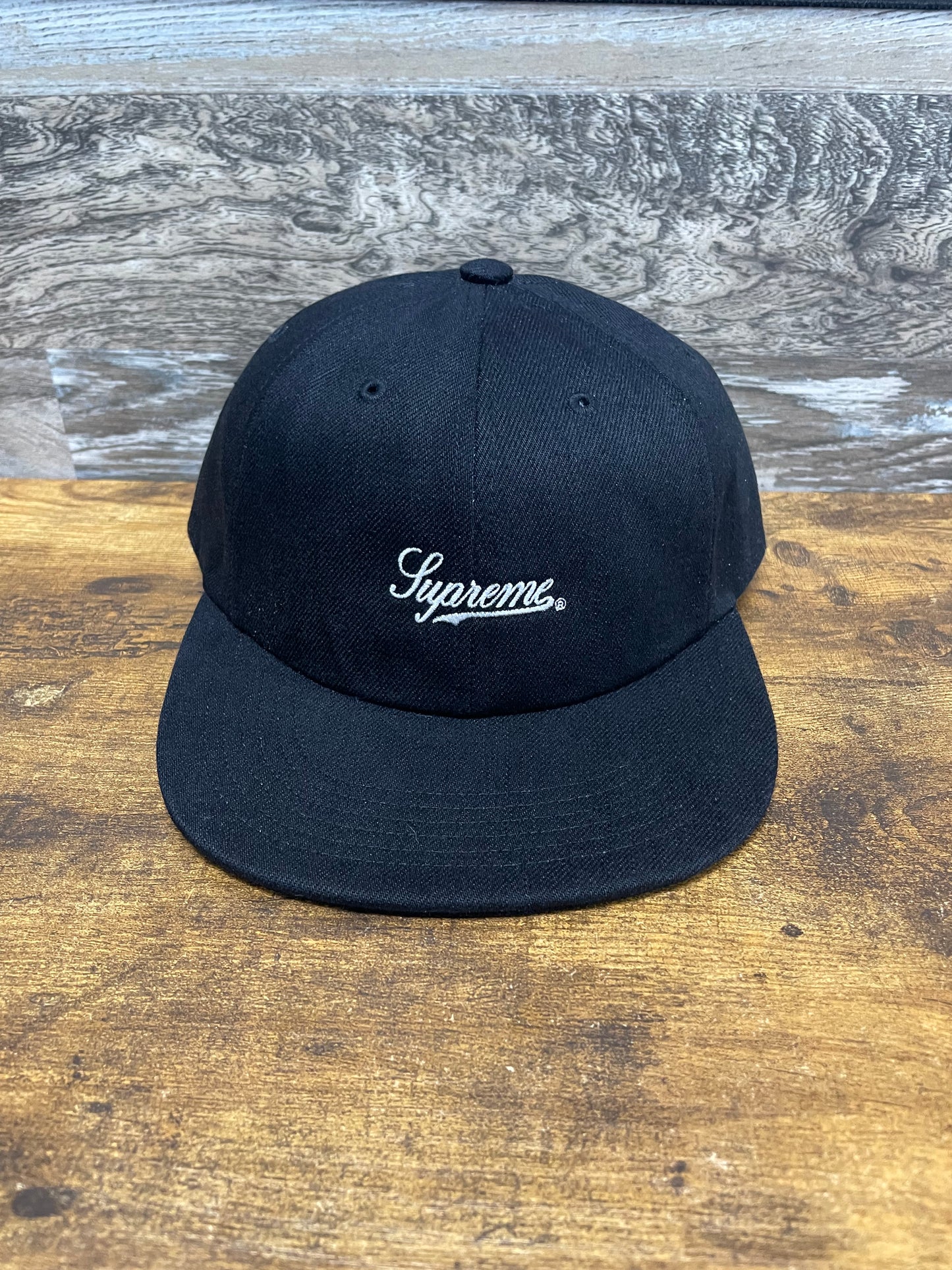 OS - Supreme Script Logo 6-Panel hat in black from the SS24 season