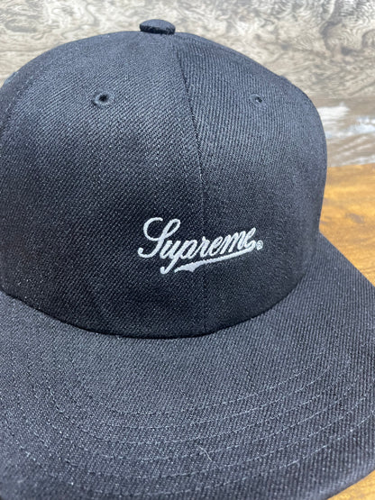 OS - Supreme Script Logo 6-Panel hat in black from the SS24 season