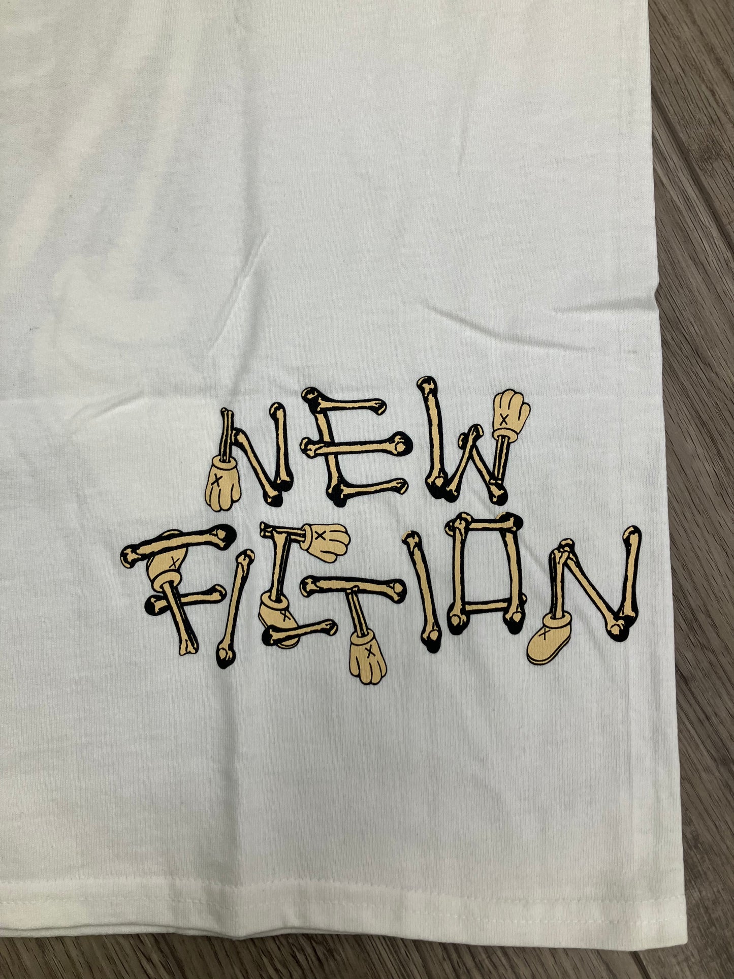 L-Kaws Skeleton New Fiction Tee