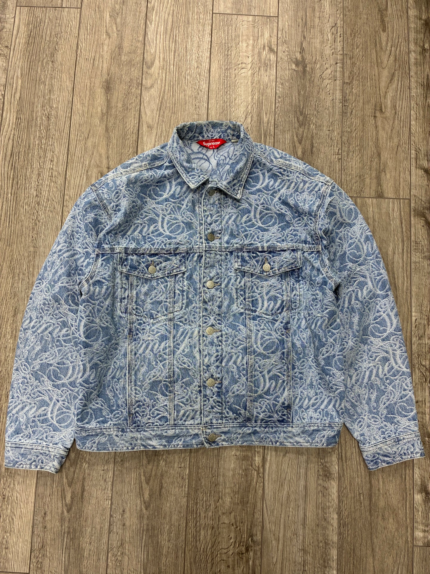 L - Supreme Script Jacquard Denim Trucker Jacket