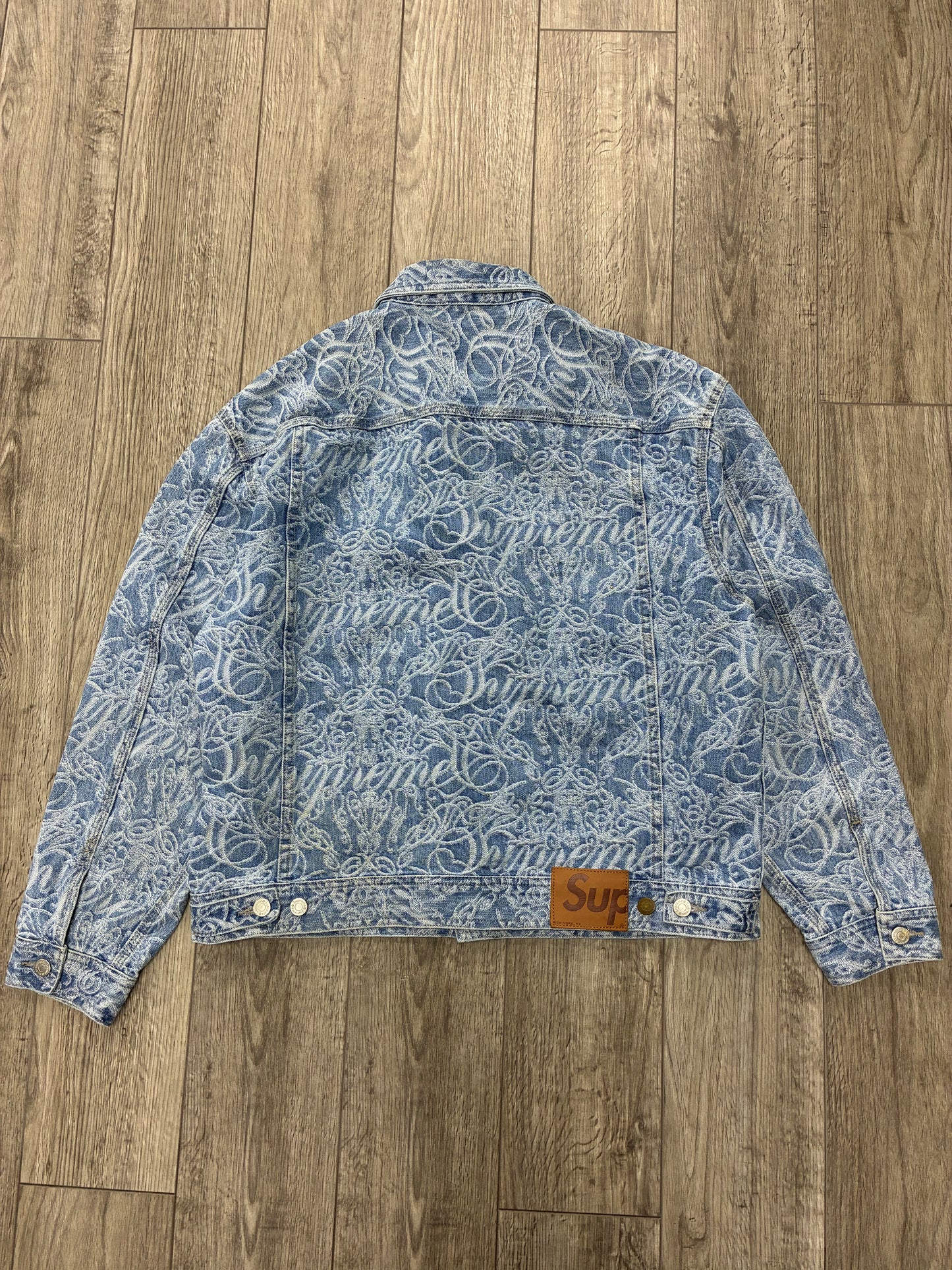 L - Supreme Script Jacquard Denim Trucker Jacket