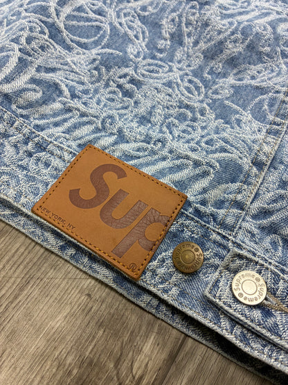 L - Supreme Script Jacquard Denim Trucker Jacket