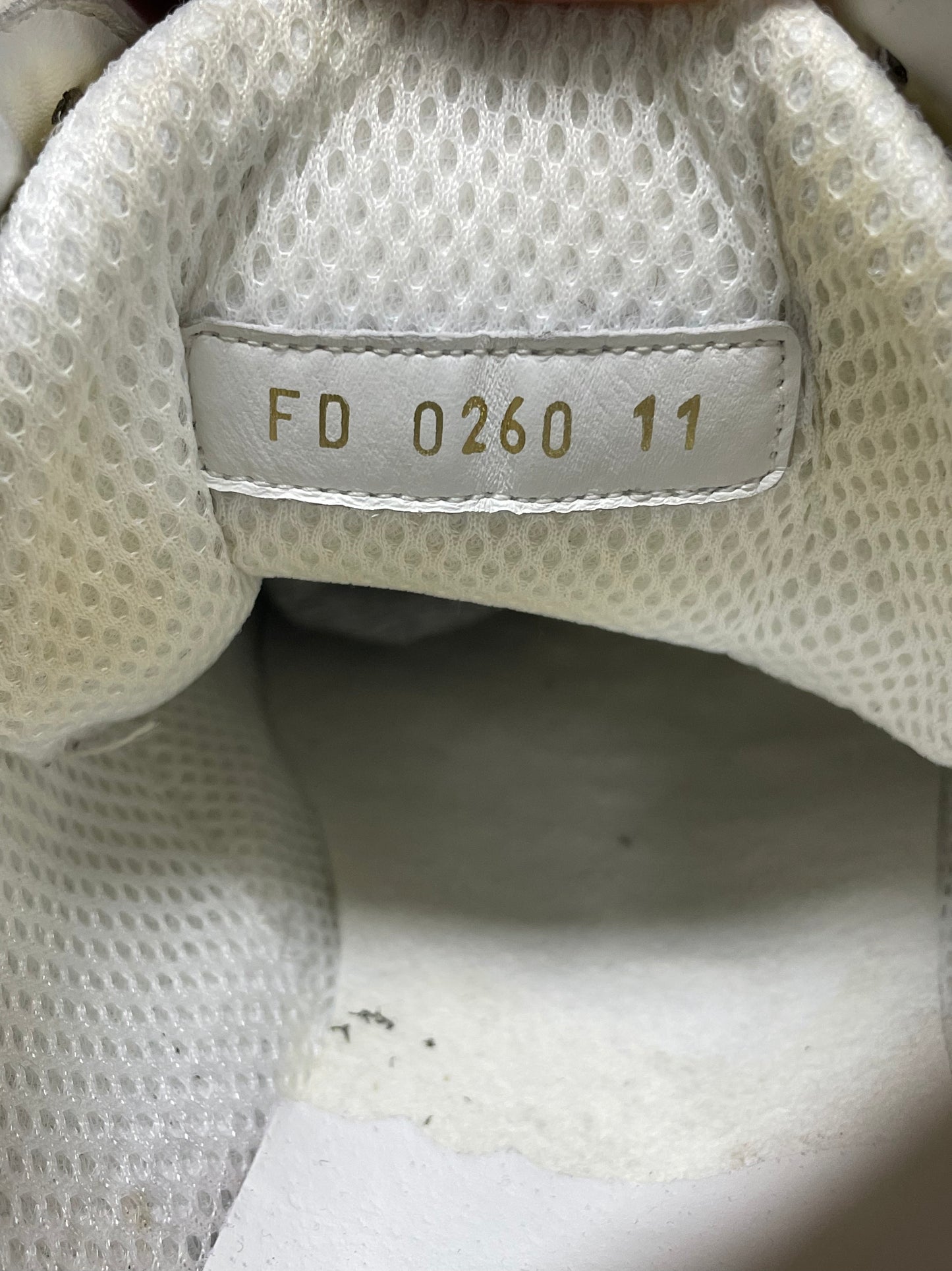 11-Louis Vuitton Metallic Gold Trail Sneaker