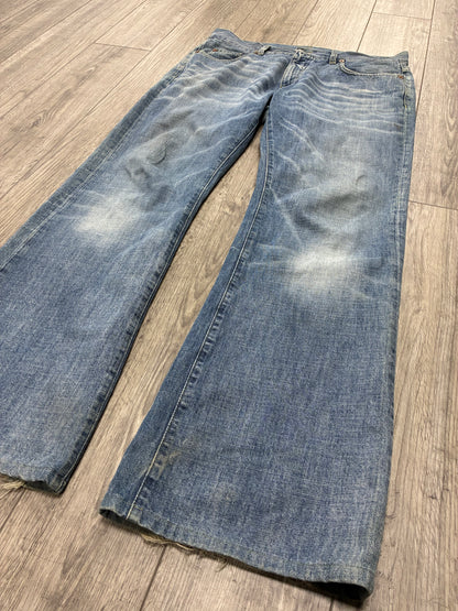 34 - Gucci Light Wash Boot Cut Jeans