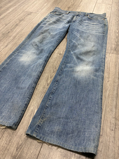 34 - Gucci Light Wash Boot Cut Jeans