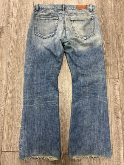34 - Gucci Light Wash Boot Cut Jeans