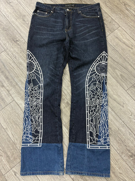 34 - Who Decides War Cowboy Indigo Denim Jeans